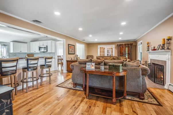 Fireplace, Interior, Kitchen, Living room, Recessed Lighting, Wood Texture Flooring