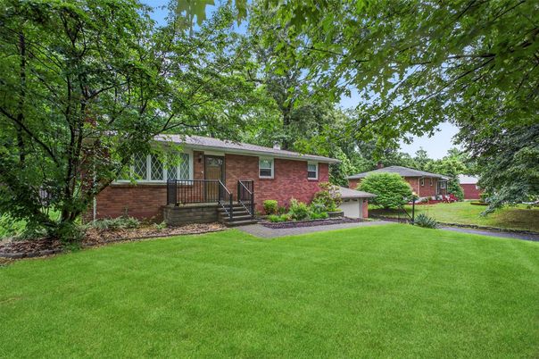 Attached, Backyard, Exterior, Facade, Brick Facade, None