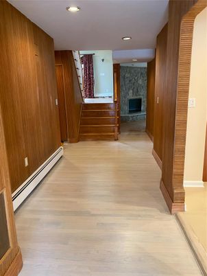 Fireplace, Interior, Recessed Lighting, Wood Texture Flooring, Wooden Walls