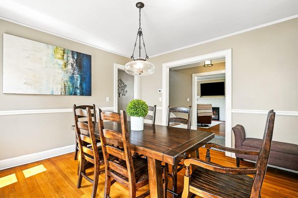 Dining room, Fireplace, Interior, Pendant Lights, Wood Texture Flooring