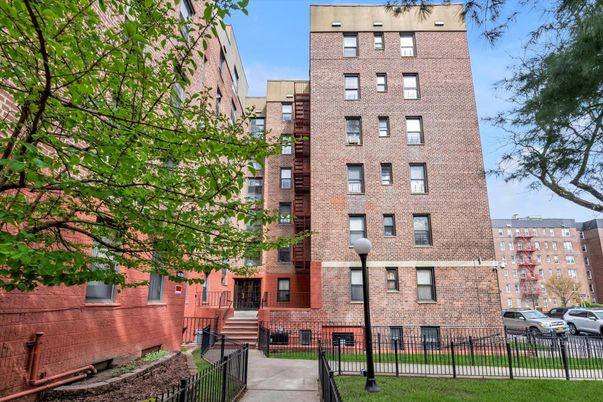 Exterior, Facade, Brick Facade, Condo Building