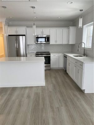 Interior, Kitchen, Pendant Lights, Recessed Lighting, Stainless Steel Appliances, Wood Texture Flooring