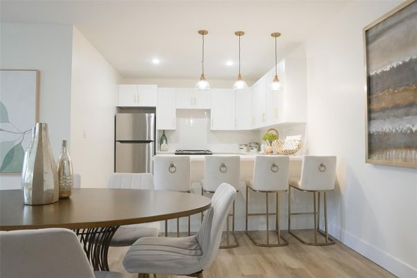 Dining room, Interior, Kitchen, Pendant Lights, Recessed Lighting, Stainless Steel Appliances, Wood Texture Flooring