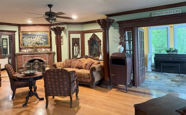 Fireplace, Interior, Living room, Piano, Recessed Lighting, Wood Texture Flooring