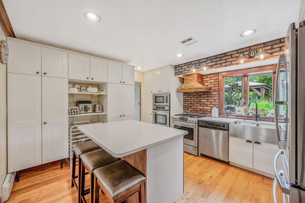 Interior, Kitchen, Recessed Lighting, Stainless Steel Appliances, Stone Walls, Wood Texture Flooring