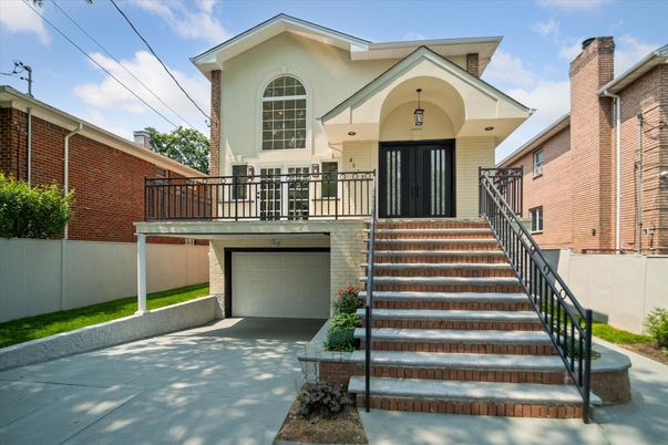 Attached, Exterior, Facade, Brick Facade, None