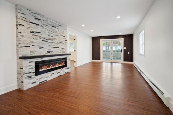 Empty room, Fireplace, Interior, Recessed Lighting, Wood Texture Flooring