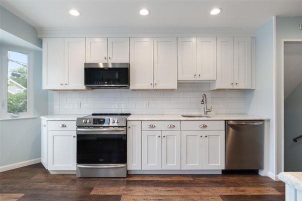 Interior, Kitchen, Recessed Lighting, Stainless Steel Appliances, Wood Texture Flooring