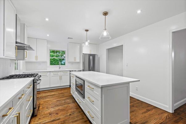 Interior, Kitchen, Pendant Lights, Recessed Lighting, Stainless Steel Appliances, Wood Texture Flooring