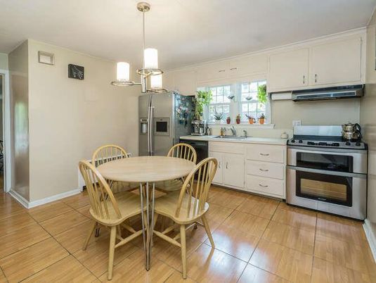 Dining room, Interior, Kitchen, Pendant Lights, Stainless Steel Appliances, Wood Texture Flooring