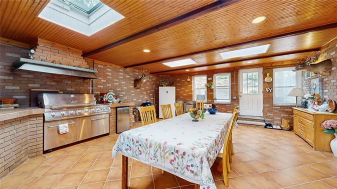 Dining room, Interior, Kitchen, Recessed Lighting, Stainless Steel Appliances, Stone Walls, Wooden Beams, Wooden Ceilings