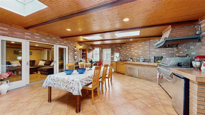 Dining room, Interior, Kitchen, Recessed Lighting, Stainless Steel Appliances, Stone Walls, Wooden Beams, Wooden Ceilings