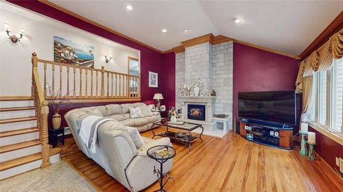 Fireplace, Interior, Living room, Recessed Lighting, Stone Walls, Wood Texture Flooring