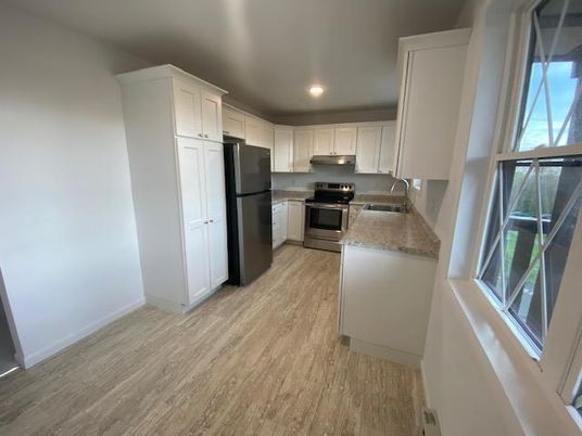 Interior, Kitchen, Recessed Lighting, Stainless Steel Appliances, Wood Texture Flooring