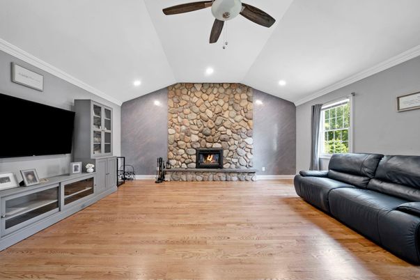 Fireplace, Interior, Recessed Lighting, Stone Walls, Wood Texture Flooring