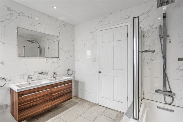 Bathroom, Dual Sink Vanities, Interior, Marble Walls, Recessed Lighting