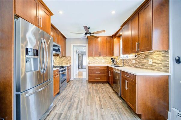 Interior, Kitchen, Recessed Lighting, Stainless Steel Appliances, Wood Texture Flooring