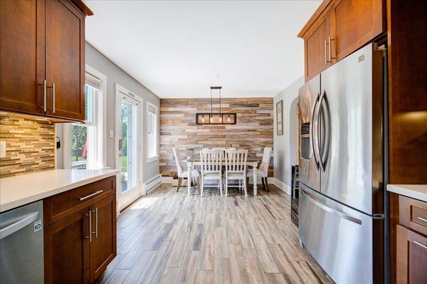 Dining room, Interior, Kitchen, Pendant Lights, Stainless Steel Appliances, Wood Texture Flooring, Wooden Walls