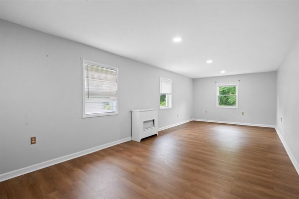 Empty room, Fireplace, Interior, Recessed Lighting, Wood Texture Flooring