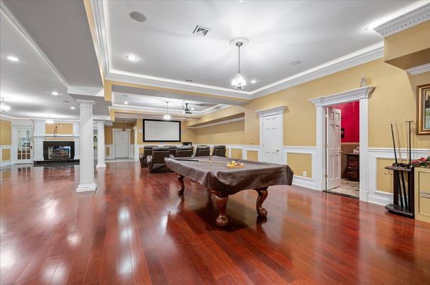 Billiard Table, Fireplace, Game Room, Interior, Pendant Lights, Projection Screen, Recessed Lighting, Wood Texture Flooring
