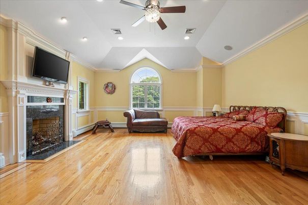 Bedroom, Fireplace, Interior, Recessed Lighting, Wood Texture Flooring