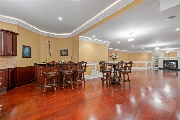 Chandelier, Dining room, Fireplace, Interior, Recessed Lighting, Wood Texture Flooring