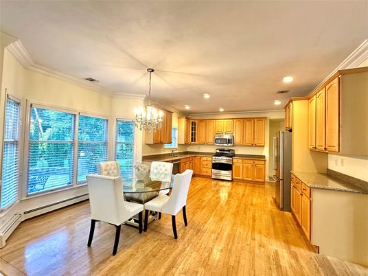 Chandelier, Dining room, Interior, Kitchen, Recessed Lighting, Stainless Steel Appliances, Wood Texture Flooring