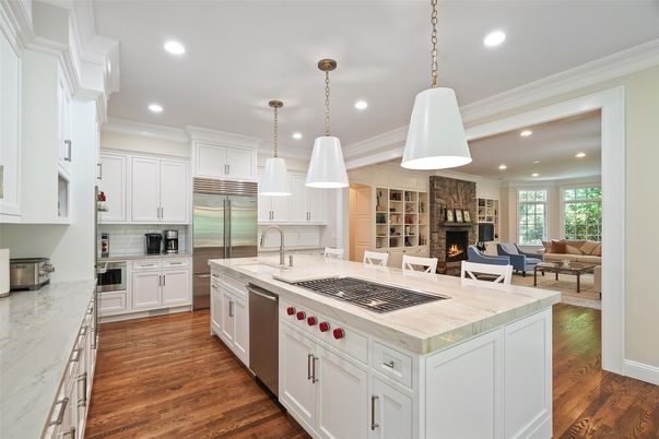 Fireplace, Interior, Kitchen, Living room, Pendant Lights, Recessed Lighting, Stainless Steel Appliances, Wood Texture Flooring