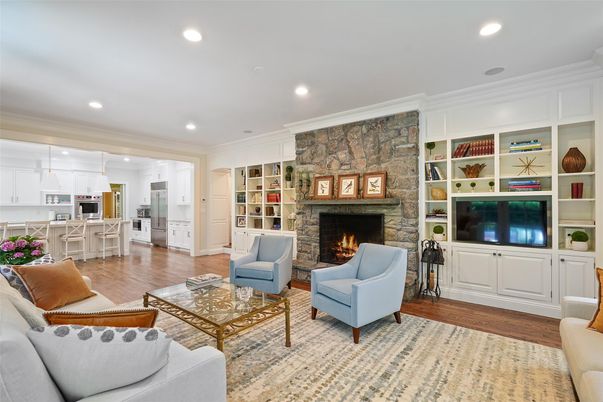 Fireplace, Interior, Living room, Pendant Lights, Recessed Lighting, Stone Walls, Wood Texture Flooring
