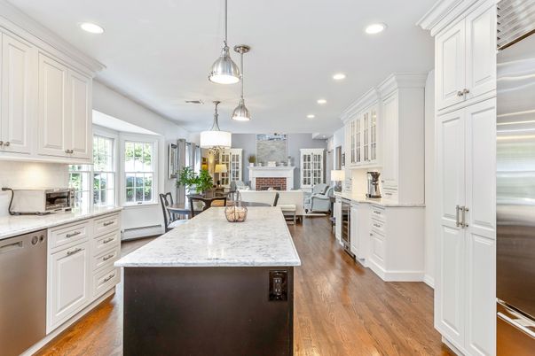Dining room, Fireplace, Interior, Kitchen, Living room, Pendant Lights, Recessed Lighting, Stainless Steel Appliances, Wood Texture Flooring
