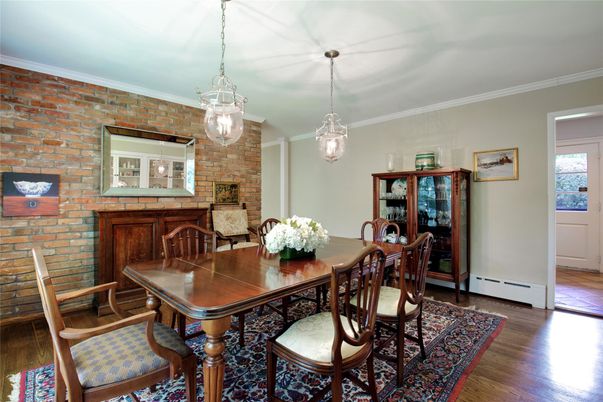 Dining room, Fireplace, Interior, Pendant Lights, Stone Walls, Wood Texture Flooring