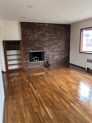 Empty room, Fireplace, Interior, Recessed Lighting, Stone Walls, Wood Texture Flooring