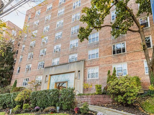 Exterior, Facade, Brick Facade, Condo Building