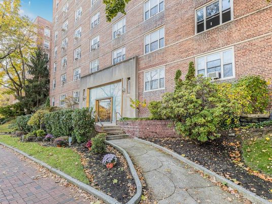 Exterior, Facade, Brick Facade, Condo Building