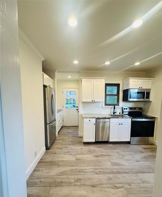 Interior, Kitchen, Recessed Lighting, Stainless Steel Appliances, Wood Texture Flooring