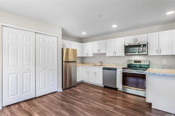 Interior, Kitchen, Recessed Lighting, Stainless Steel Appliances, Wood Texture Flooring