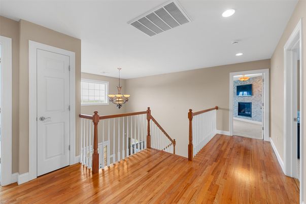 Chandelier, Fireplace, Interior, Recessed Lighting, Wood Texture Flooring