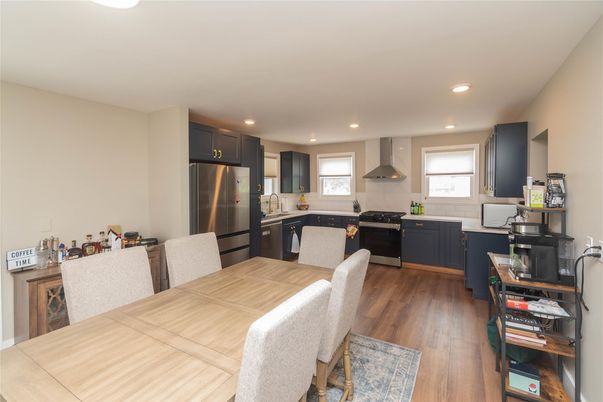 Dining room, Interior, Kitchen, Recessed Lighting, Stainless Steel Appliances, Wood Texture Flooring