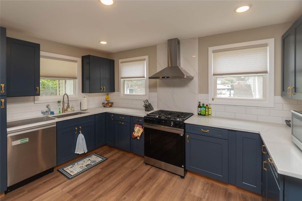 Interior, Kitchen, Recessed Lighting, Stainless Steel Appliances, Wood Texture Flooring