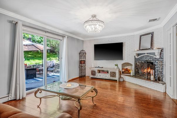 Chandelier, Fireplace, Interior, Stone Walls, Wood Texture Flooring