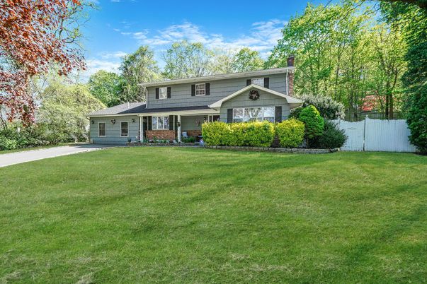 Attached, Backyard, Exterior, Facade, Brick Facade, Split Level