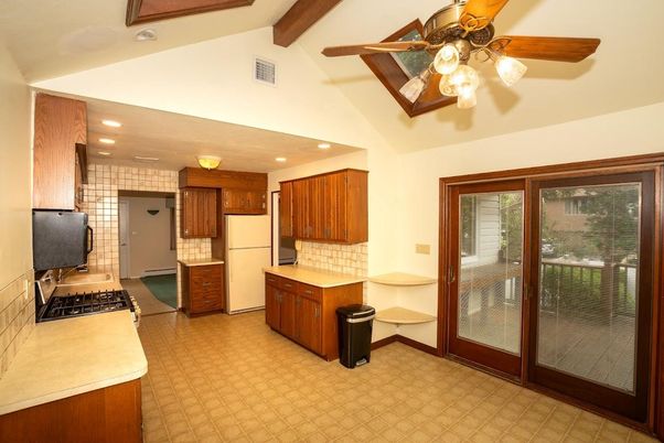 Interior, Kitchen, Recessed Lighting, Tile Countertops, Wooden Beams