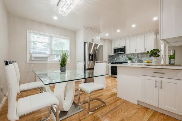 Dining room, Interior, Kitchen, Recessed Lighting, Stainless Steel Appliances, Wood Texture Flooring