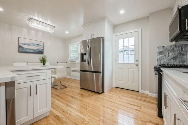 Dining room, Interior, Kitchen, Recessed Lighting, Stainless Steel Appliances, Wood Texture Flooring
