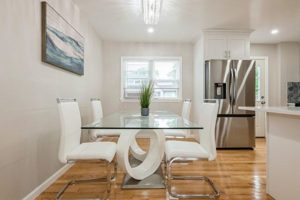 Dining room, Interior, Kitchen, Recessed Lighting, Stainless Steel Appliances, Wood Texture Flooring
