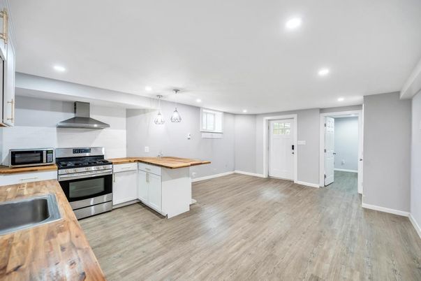 Interior, Kitchen, Pendant Lights, Recessed Lighting, Stainless Steel Appliances, Wood Texture Flooring