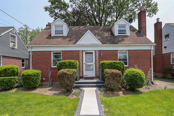 Exterior, Facade, Brick Facade, Cape Cod