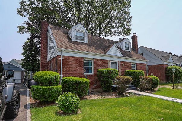 Exterior, Facade, Brick Facade, Cape Cod