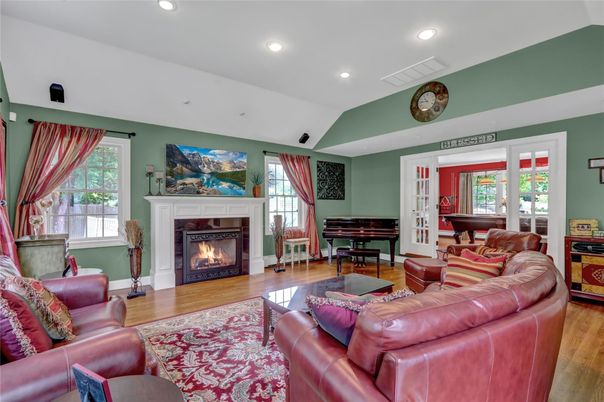 Fireplace, Interior, Living room, Piano, Recessed Lighting, Wood Texture Flooring