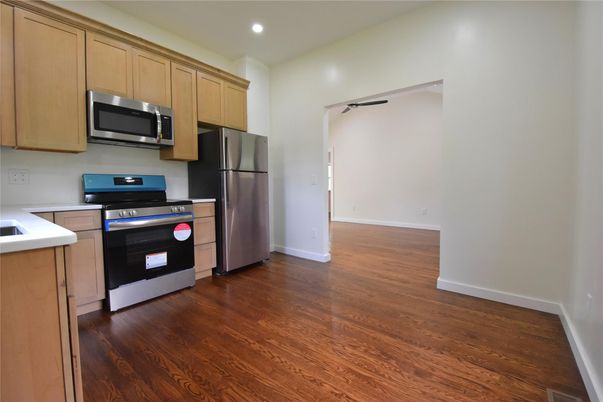 Interior, Kitchen, Recessed Lighting, Stainless Steel Appliances, Wood Texture Flooring